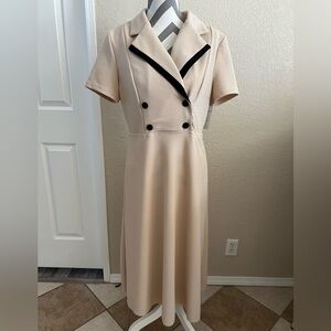 Cream color with black piping dress